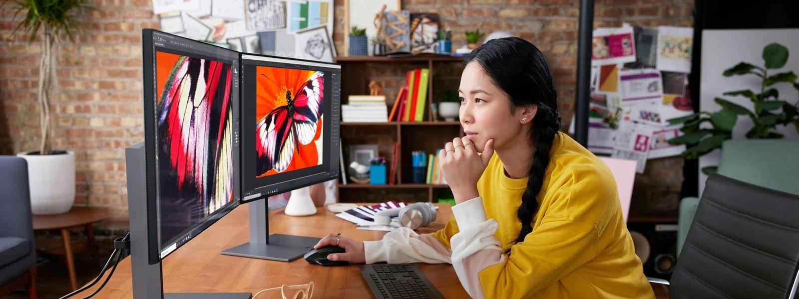 A woman at her desktop computer
